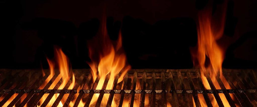 flames inside a grill